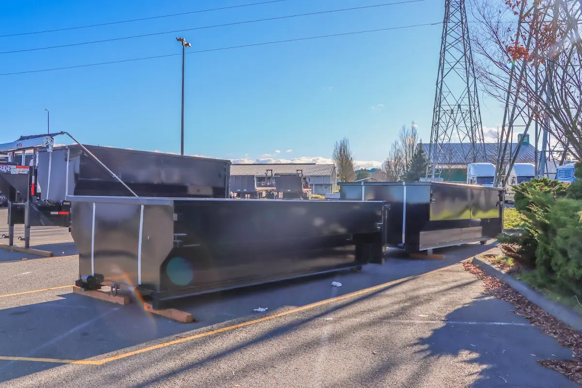 Roll-off dumpster ready for waste disposal at job site for Yard Waste Dumpster Rental in Davie